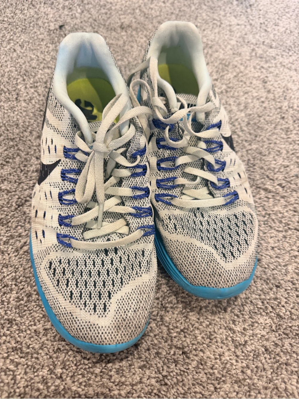 Nike Women’s Light Gray and Blue Mesh Running Sneakers